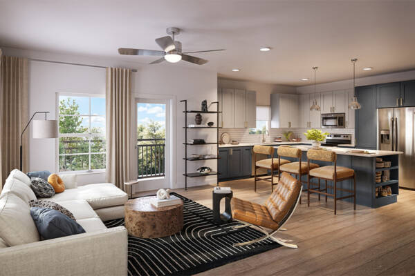 Rendering of the inside of an apartment at Soltra Brassline. The sun-drenched rendering depicts an open layout with a living room, kitchen layout and balcony access.
